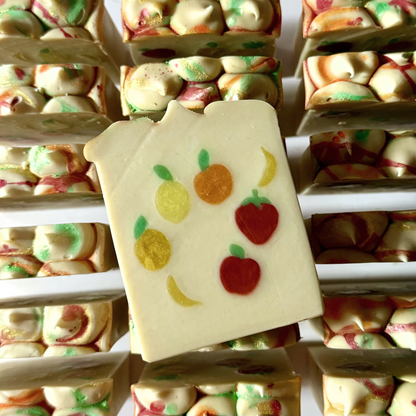 Soap with fruit designs on a tray.