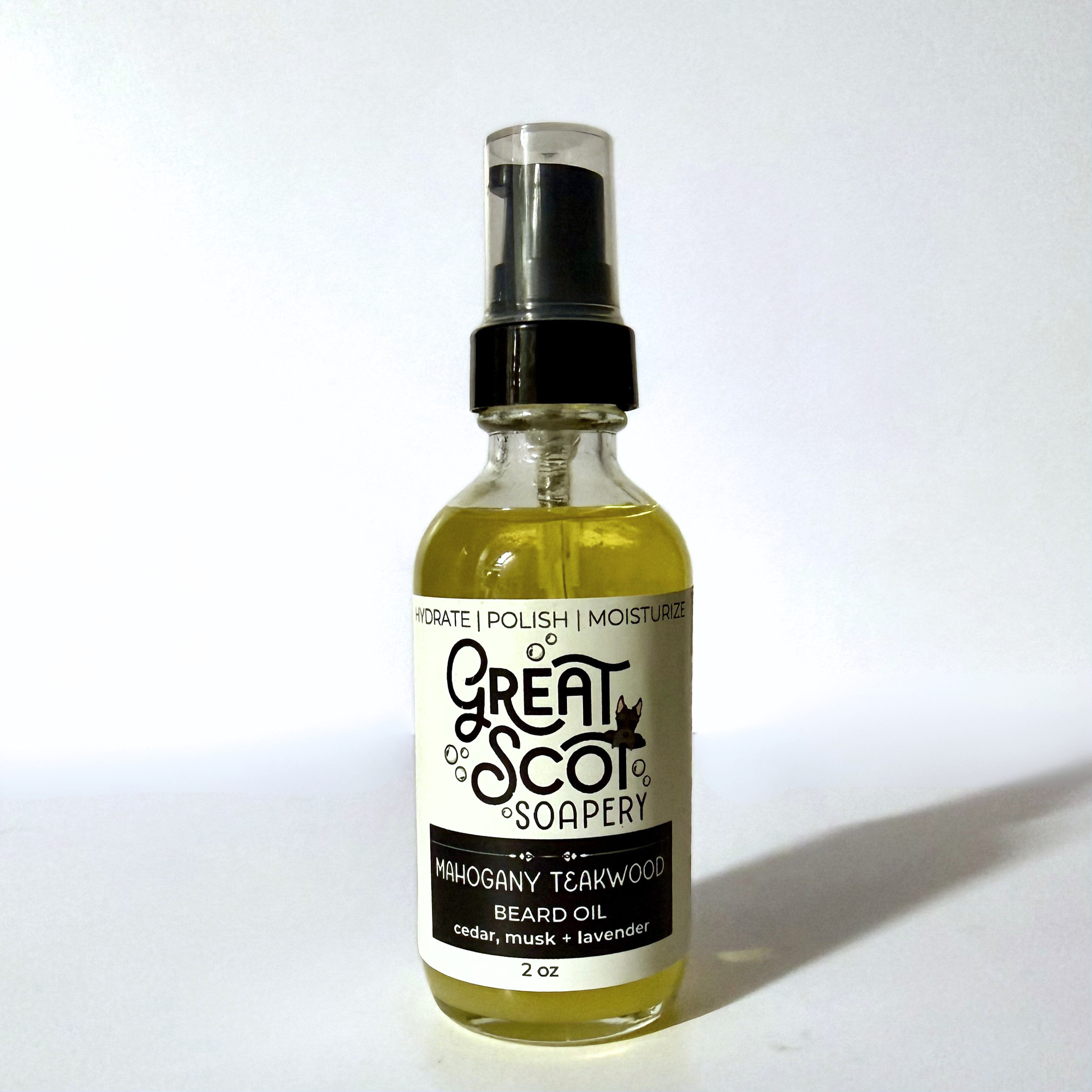 Bottle of Great Scot Soapery Mahogany Teakwood beard oil on a white background