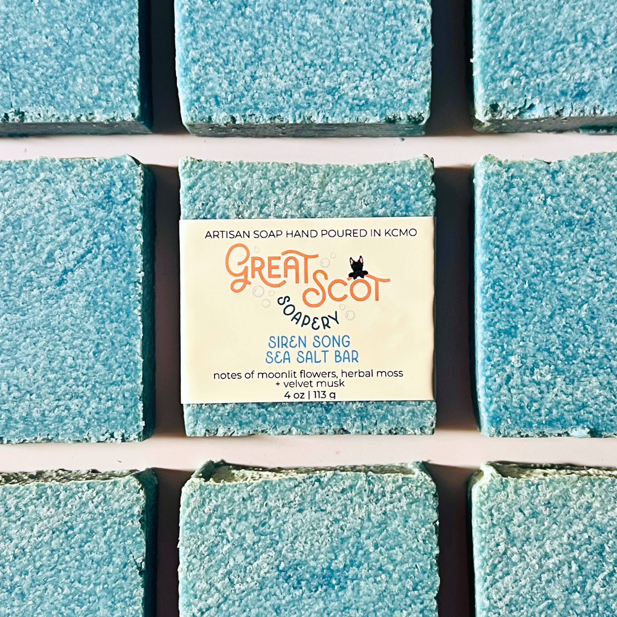 Blue soap bars with a 'Great Scot Soapery' label on a white background