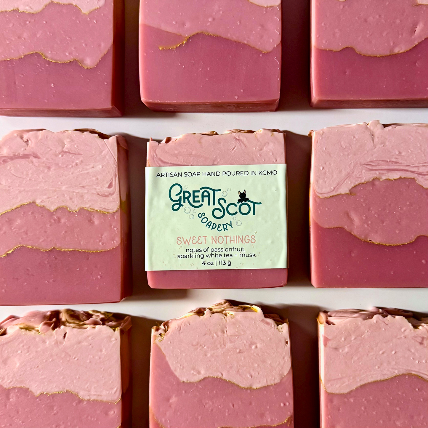 Pink soap bars with a 'Great Scot' soap bar in the center
