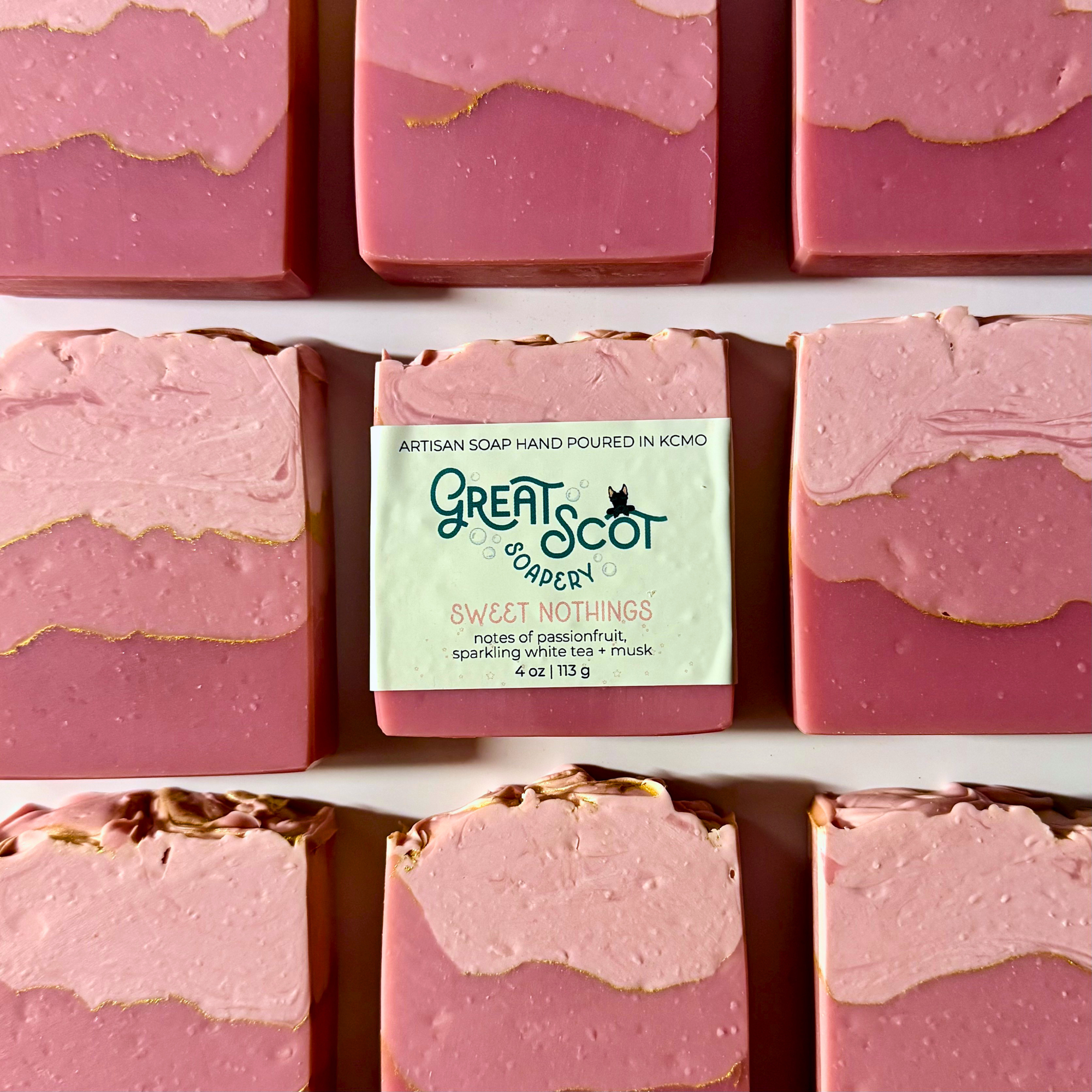 Pink soap bars with a 'Great Scot' soap bar in the center